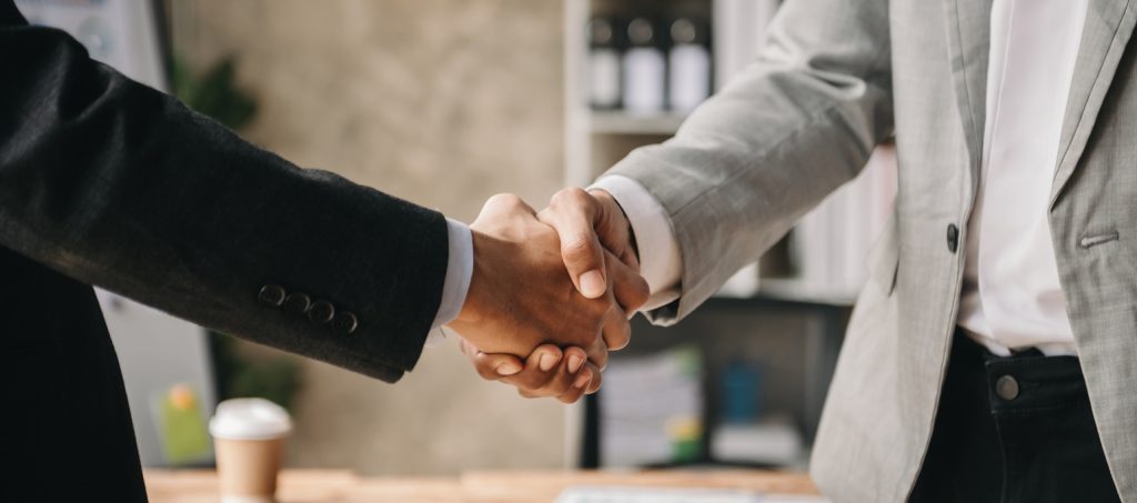 business owners shaking hands