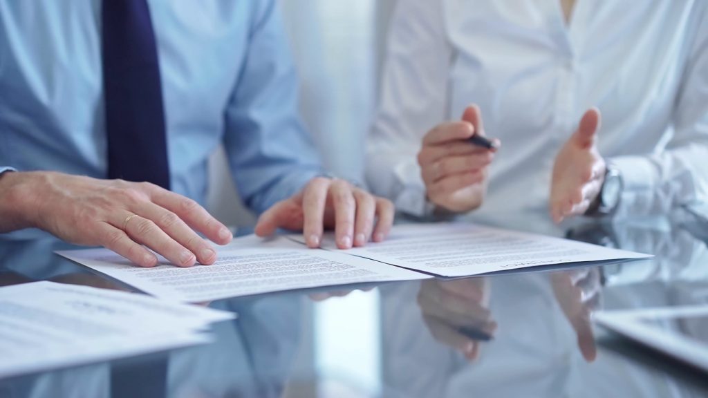 business people discussing documentation